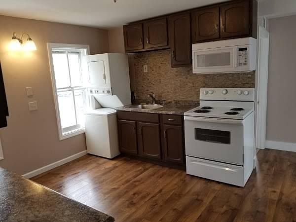 Kitchen - New microwave, sink, counter, hardwood floors