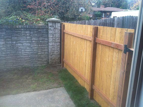 Fully Fenced backyard with gate access