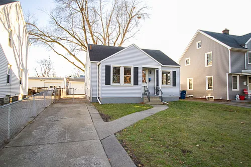 Beautiful One-Story 2BR Home in W Toledo! New Hardwood Floors, Enclosed Back Porch, Remodeled Bat... — Photo 1