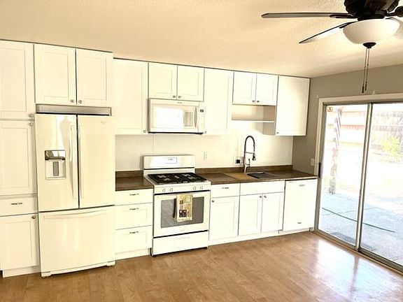 Kitchen with all full size appliances.