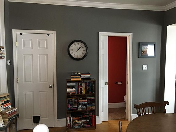 Basement entrance with pantry wall