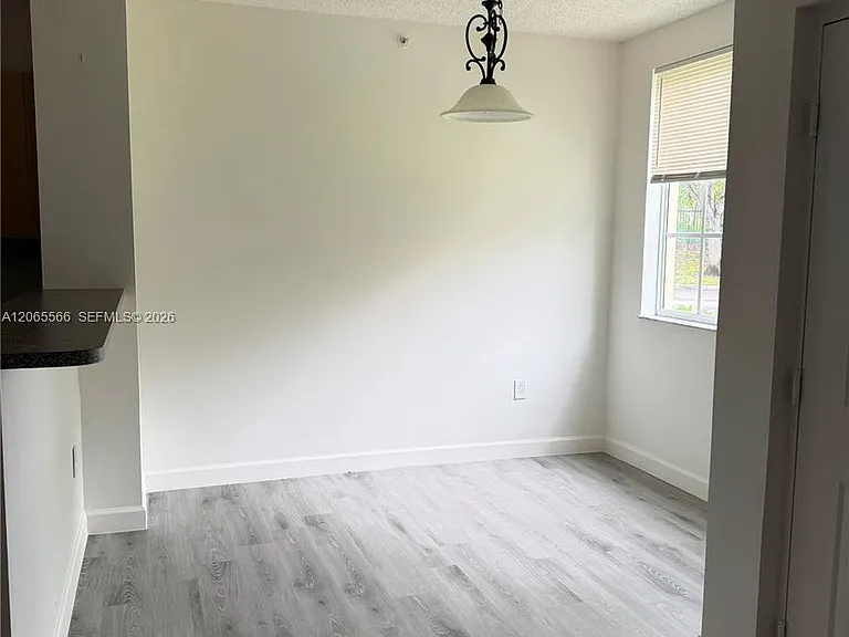 8010 N Nob Hill Rd #102 — Photo 9