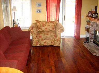 Cozy family room with used brick fireplace