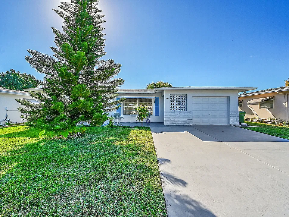 7240 NW 8th Ct