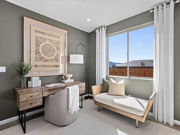 Quiet den makes a great home office.