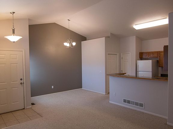 Living Room looking into Kitchen and Dining Area