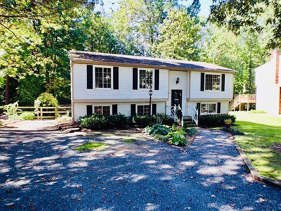 Outside Front with 2 car width side by side driveway