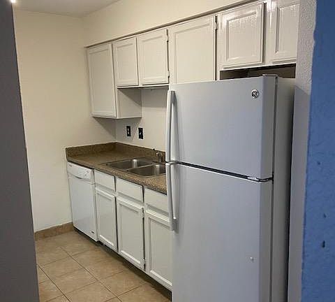 Tons of cabinet space and pantry.