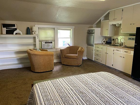 Comfortable Bed and chairs.