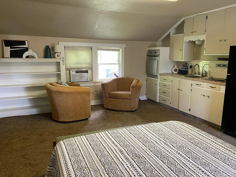 Comfortable Bed and chairs.