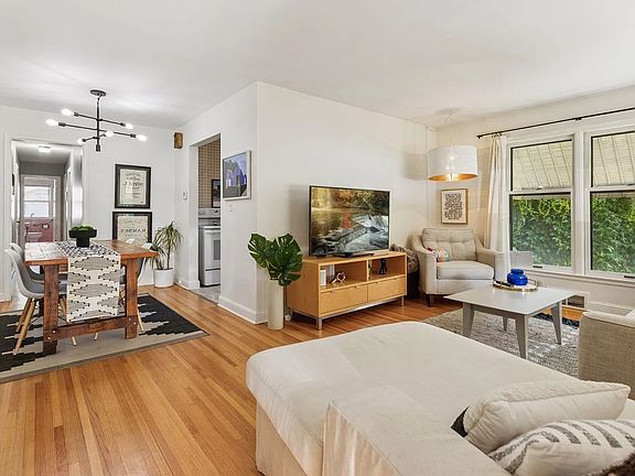 This is your view of your first floor living room and dining when you first enter the home! **All pictures of the first floor are from the other unit, and mirror what this unit will look like when it's done.