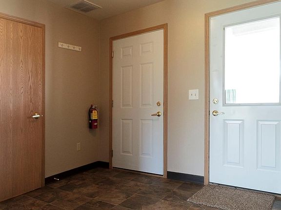 Entryway - the door in the center leads to the attached gara