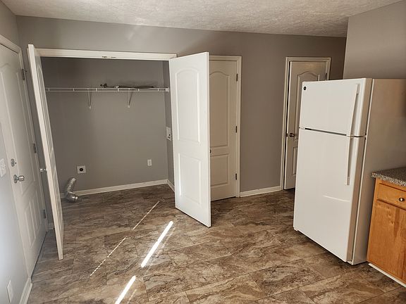 kitchen showing laundry room