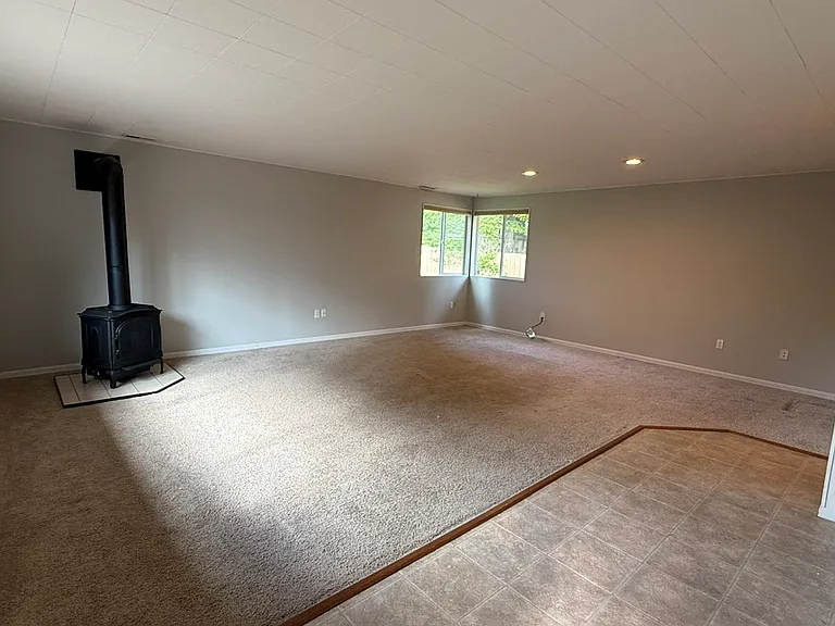 Large bonus room/family room.