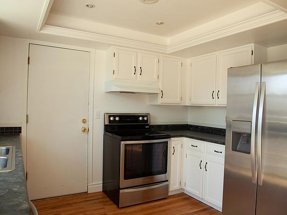 Kitchen - Lots of storage. Door leads to 2 car unfinished garage.