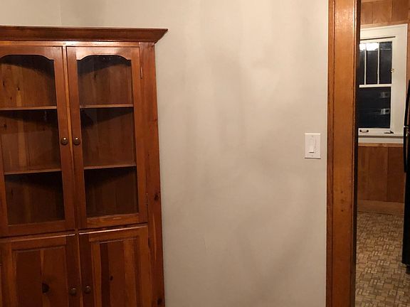 Dining area with curio cabinet