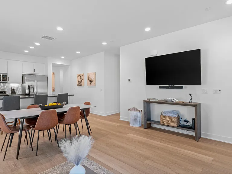 The TV features a sound bar perfect for movie night.