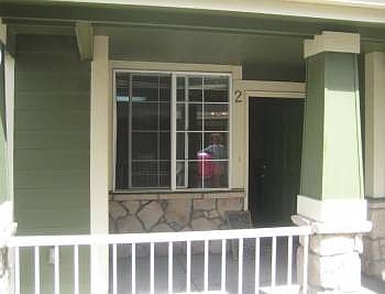 Front door area with outside storage locker
