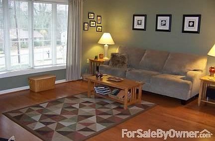 Formal Living Room
						:
						Large bay window; hardwood floors