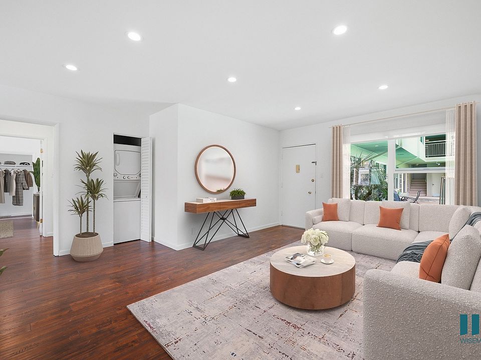 Living Room with Large-Size Windows, Recessed Lighting, and Vinyl Flooring