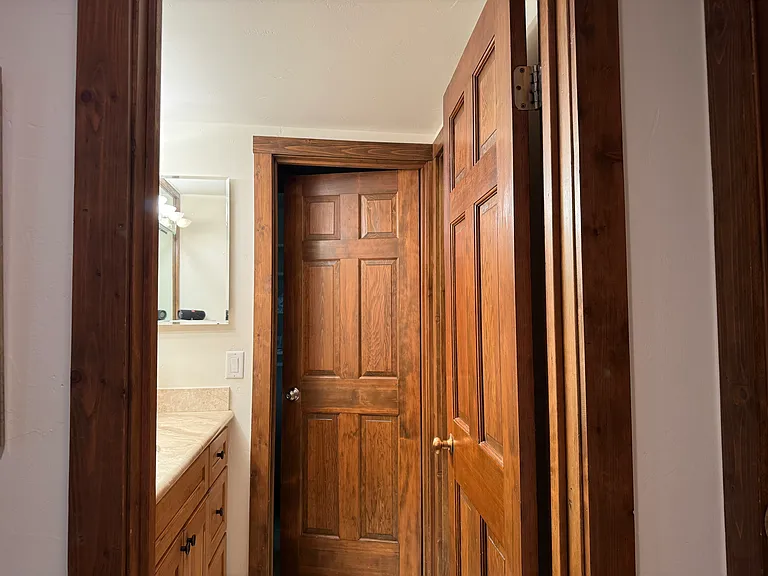 Ground floor bath entry, two rooms plus an entrance into the large closet and bedroom. Tub shower combination.