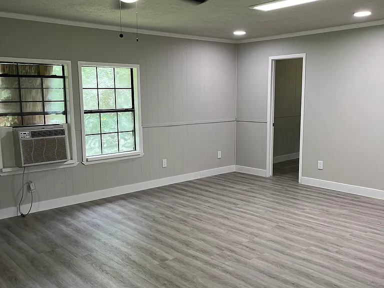 Large family room with plenty of windows