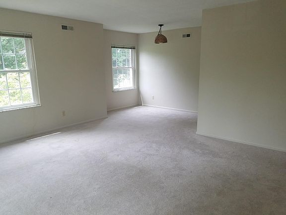 Living Room/Dining Room with lots of windows and light!