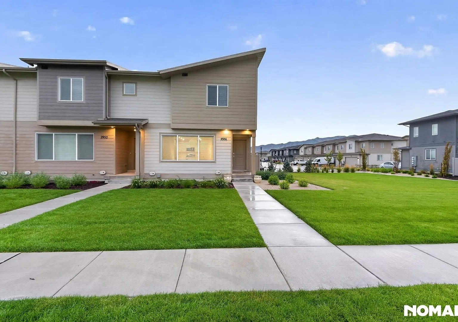 Spacious 3-Bed End-Unit Townhome in Eagle Mountain with 2-Car Garage & Storage Basement — Photo 1