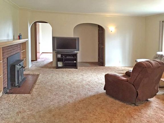 Charming arched entrances and crown molding add to the charm of this home.  