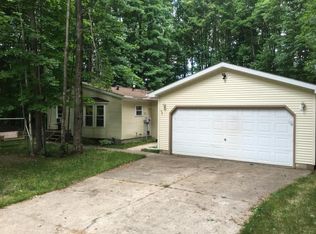 8951 Whispering Pines Dr, Mancelona, MI 49659