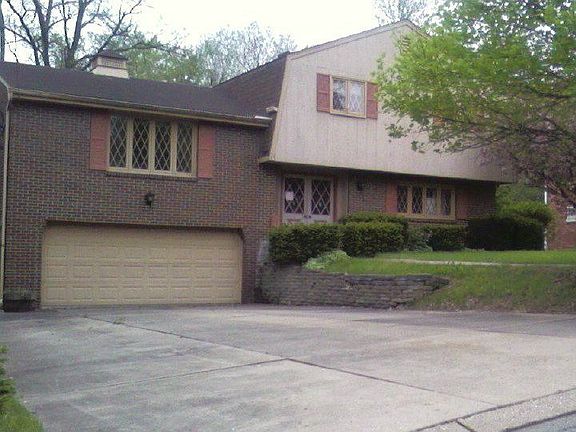 104 RIO MAR DRIVE FRONT/SIDE VIEW OF 2 CAR GARAGE