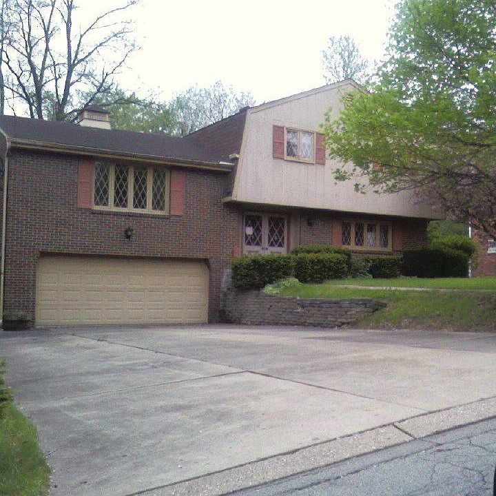104 RIO MAR DRIVE FRONT/SIDE VIEW OF 2 CAR GARAGE