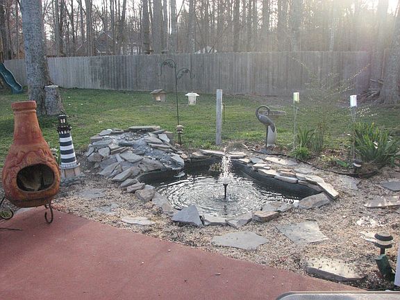 Relaxing pond with waterfall