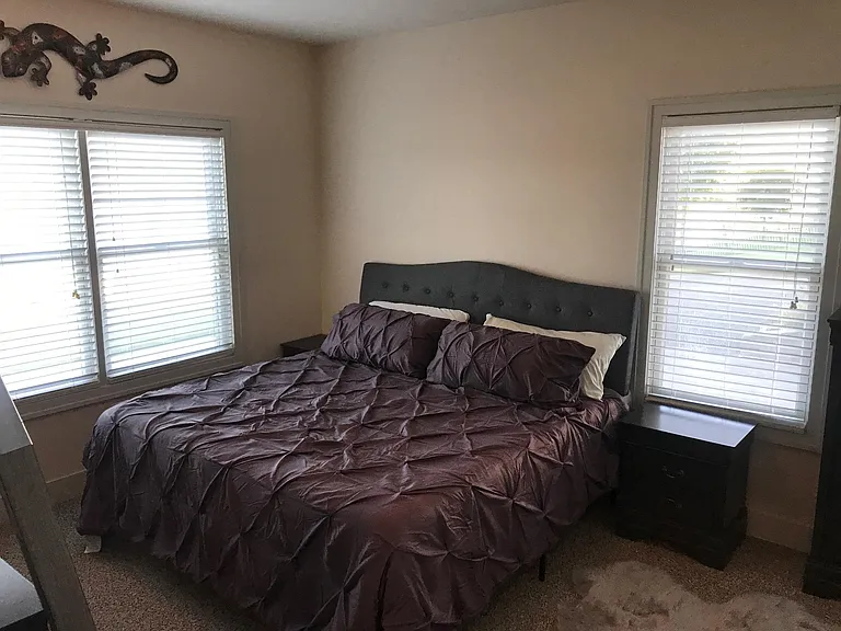 King bed is new and extra large - artwork now on wall