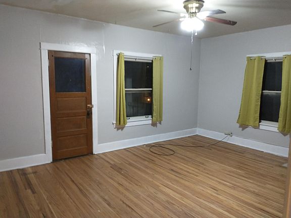 Living Room. High ceilings, hardwood floors, big windows, door to balcony