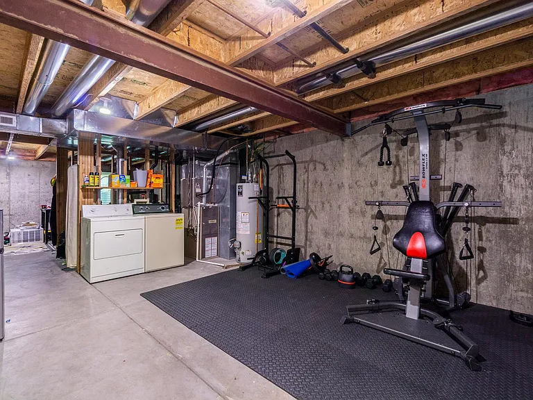 basement with washer and dryer included
