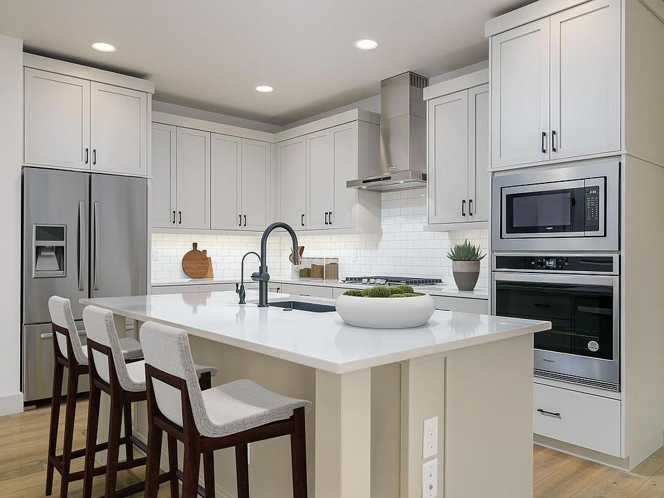 Well-equipped kitchen with sizable center island and abundant storage