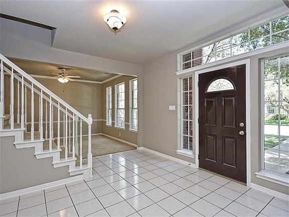 Natural light floods the entry.