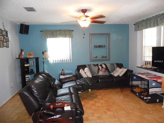 Living area features parquet flooring!
