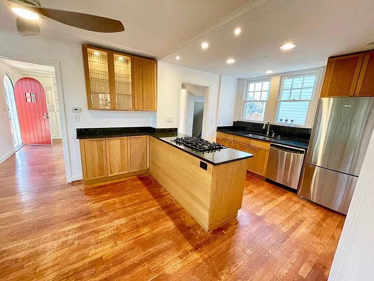 Gas range! Kitchen is in the center of the home.