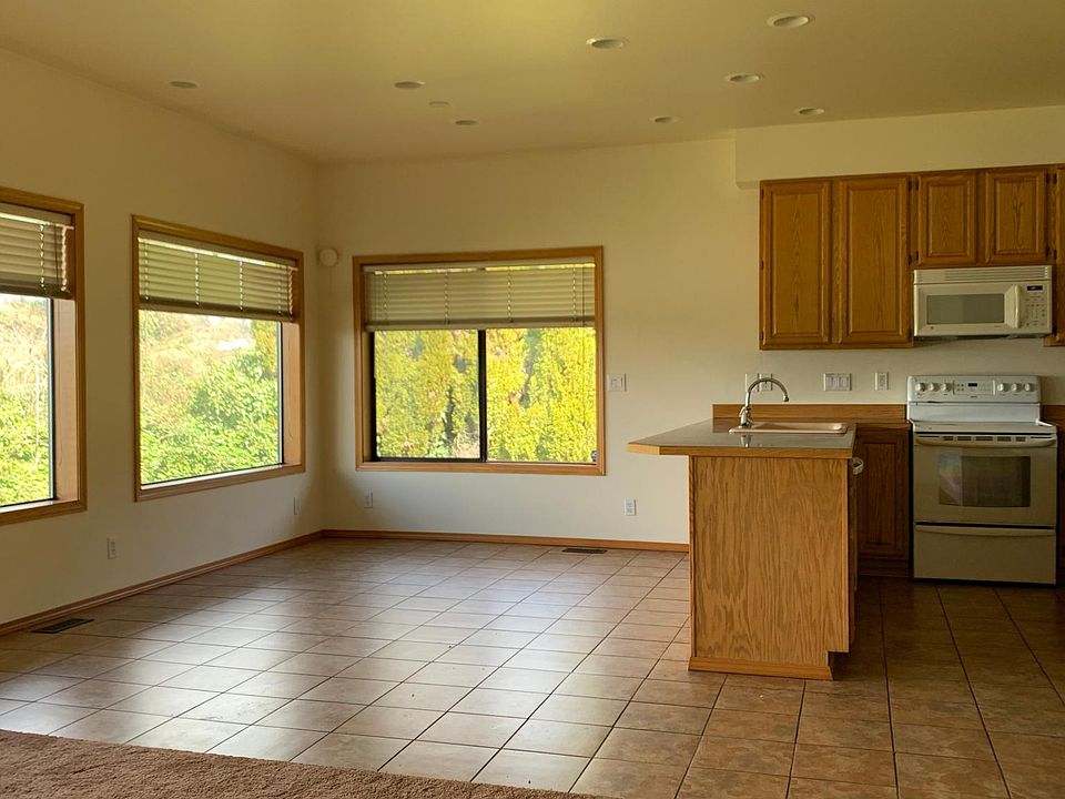 Open concept kitchen, dining and living room