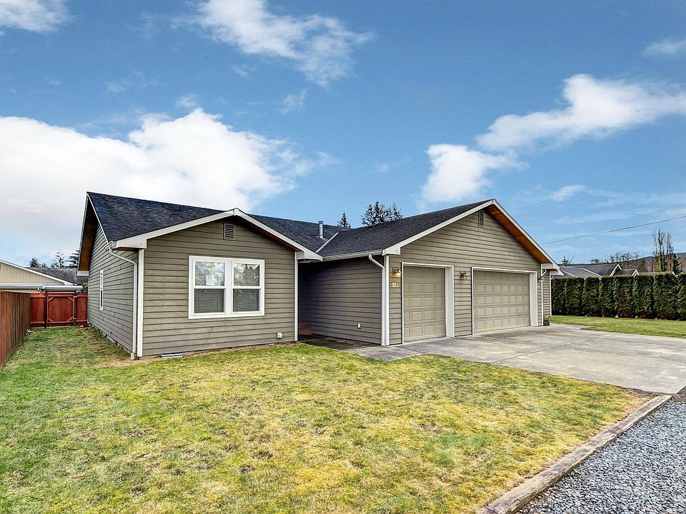 Corner Unit with 1-Car garage, full length driveway, off street parking and spacious front yard.