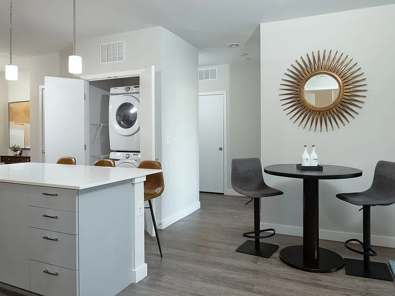Kitchen and dining area with hard surface flooring