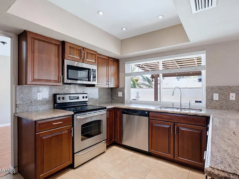 6259 E Acoma Dr — Photo 2