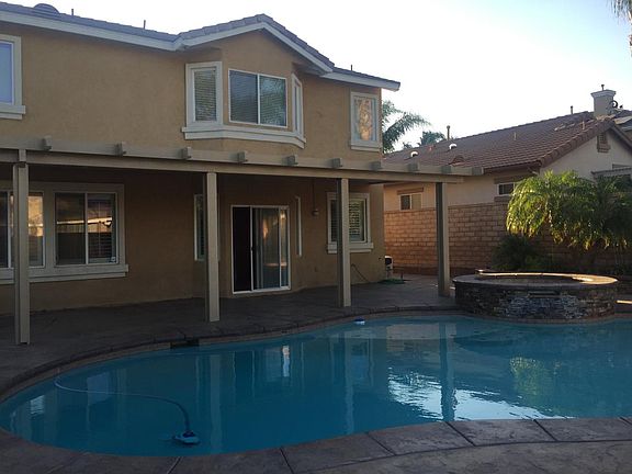 beautiful sparkling pool with custom jacuzzi