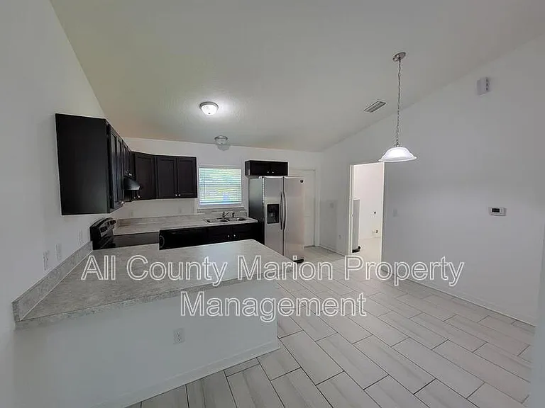 6374 NW 62nd Pl — Photo 4