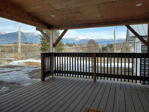 View from the covered deck. Mountain views are better than the camera can handle.