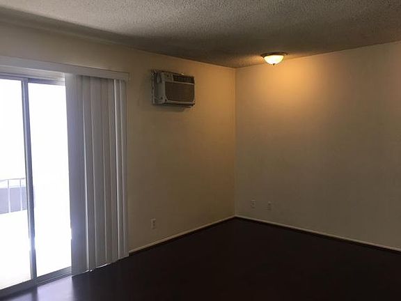 A/C in bedroom which also opens onto a large balcony 