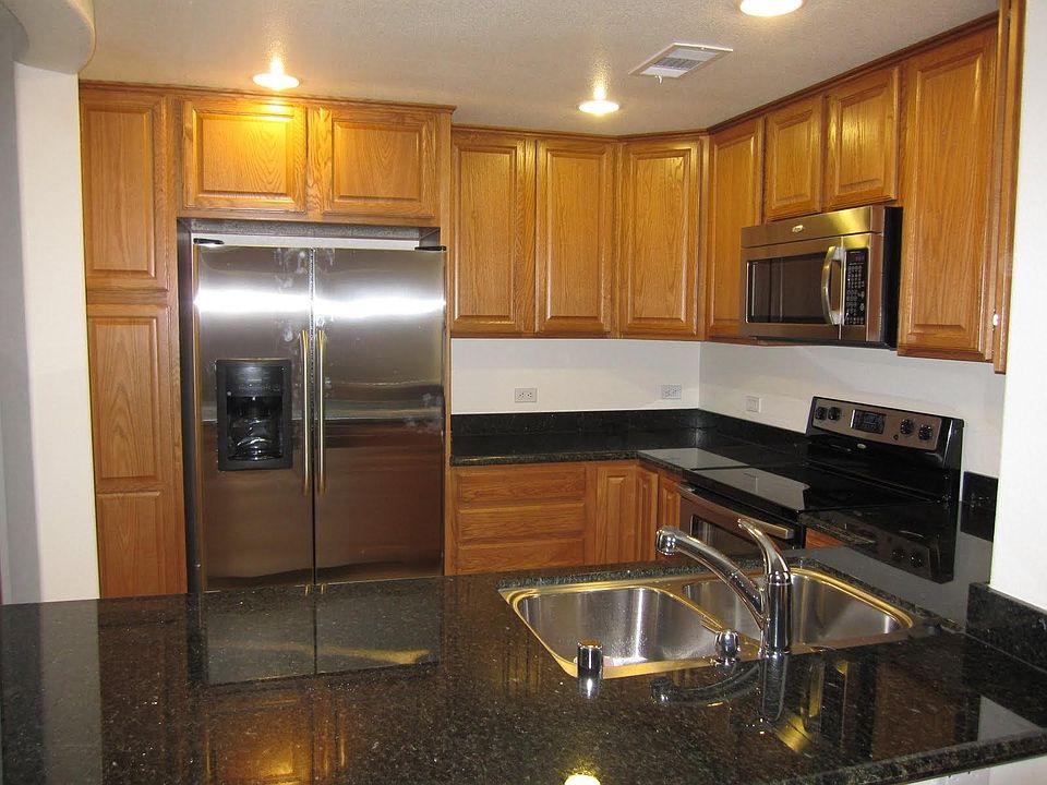 Well-equipped kitchen with stainless steel appliances.