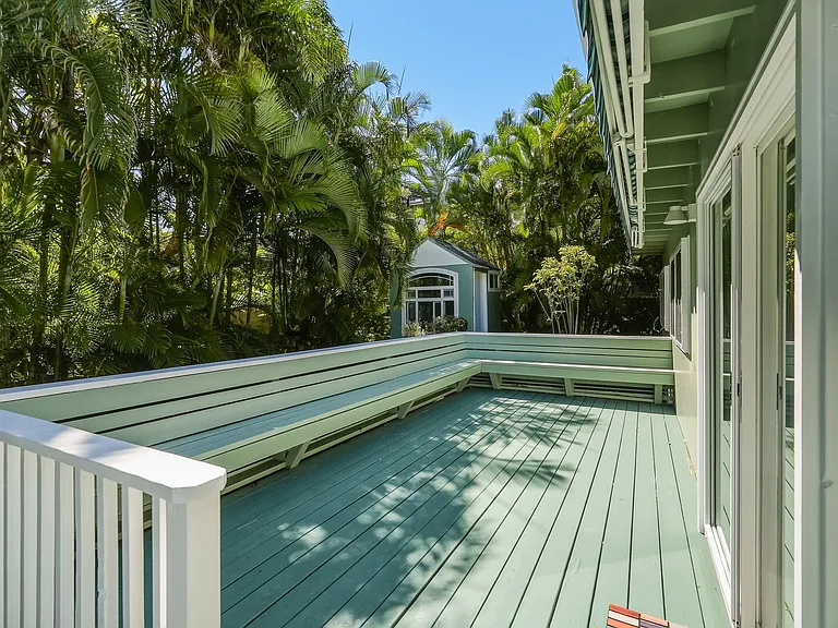 The deck is 200 sq. ft. and has built in wrap around seating.